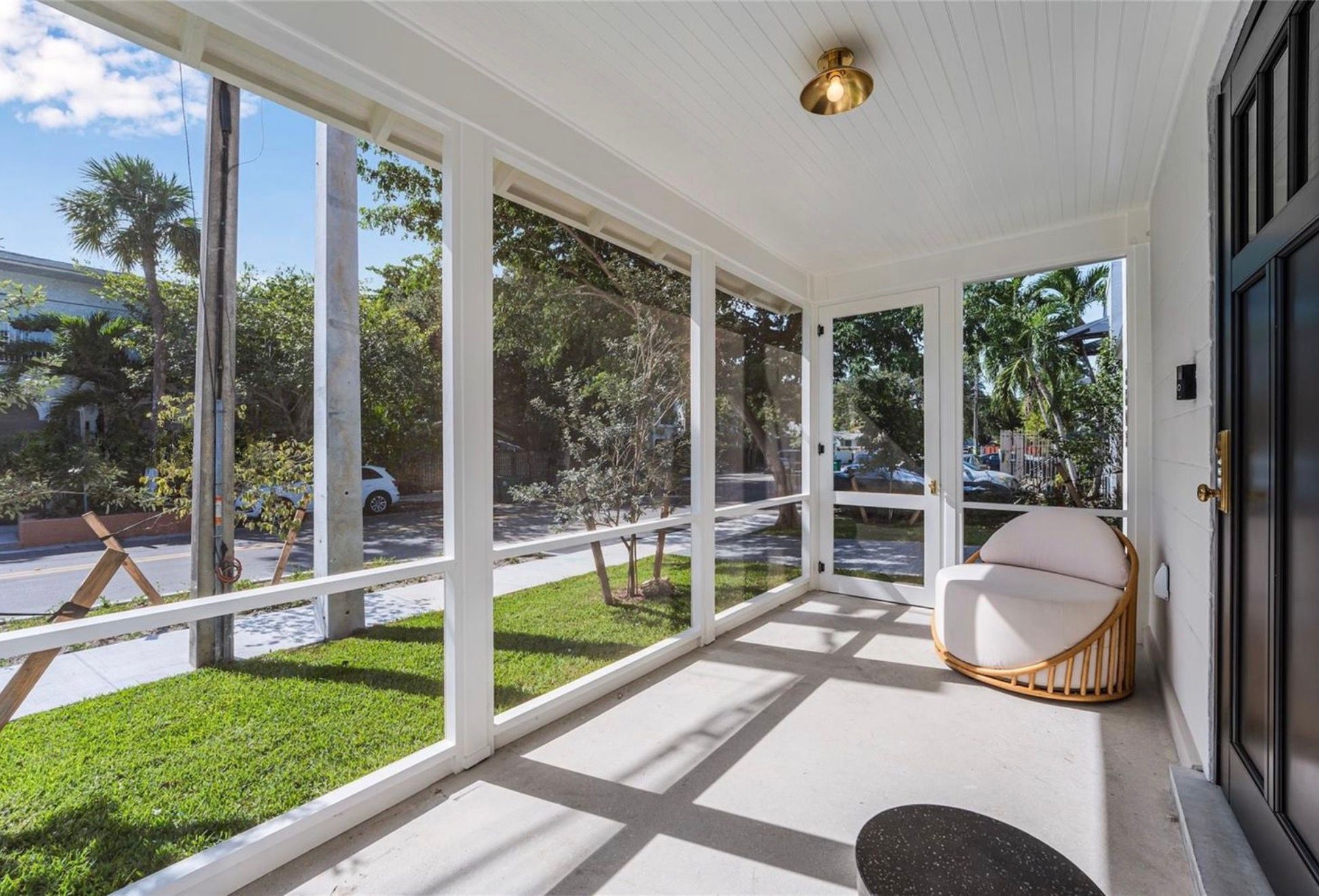 Screened porch overlooking the lawn